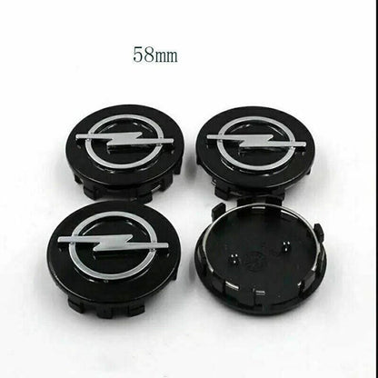 Set 4 Tappi Coprimozzo Ruota 58 mm Neri Compatibili Con Opel Corsa Astra Meriva Insignia Adam In ABS Ad Incastro