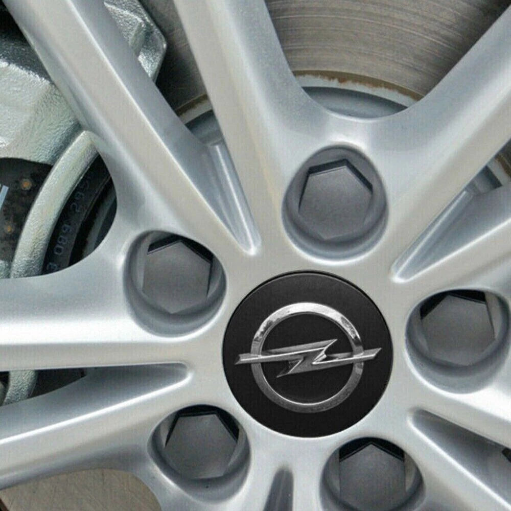 Set 4 Tappi Coprimozzo 58 mm Nero per Opel Corsa Astra Meriva Insignia Adam – Facili da Montare
